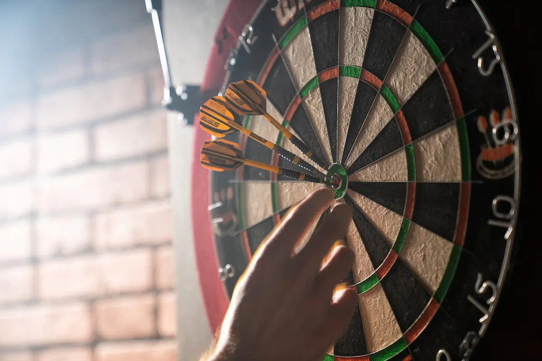 Dartscheibe mit Pfeilen